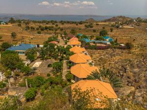 an aerial view of a resort with orange roofs at The Lahe Hotels in Mwanza