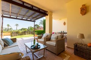 a living room with a couch and chairs and a table at BELLA GADEA in Altea