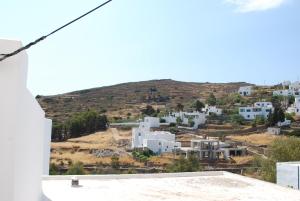 a view of a town from the roof of a building at Antigonis traditional house in lefkes village in Lefkes