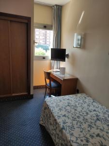 A bed or beds in a room at Hotel Ébora by Vivere Stays