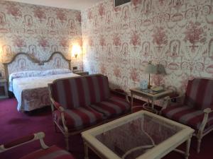 A bed or beds in a room at Hotel Ébora by Vivere Stays