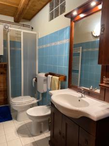 Ванная комната в Frazione Duc Apartments