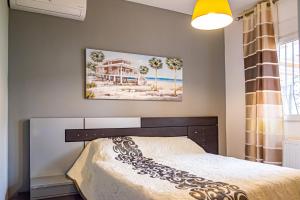 Ένα ή περισσότερα κρεβάτια σε δωμάτιο στο Villa Helene