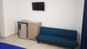 TV a/nebo společenská místnost v ubytování Breeze