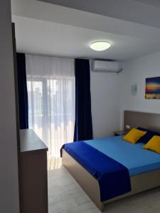 Postel nebo postele na pokoji v ubytování Breeze