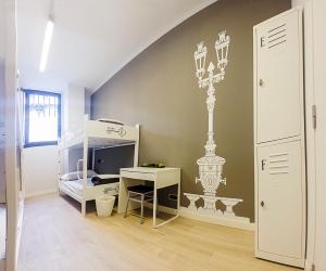 Televízia a/alebo spoločenská miestnosť v ubytovaní Room018BCN