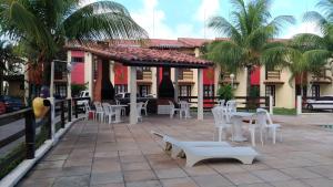Restoran atau tempat lain untuk makan di Casa Duplex 3 suítes em Condomínio Fechado