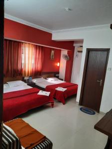 Postel nebo postele na pokoji v ubytování HOTEL S K PALACE