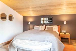 מיטה או מיטות בחדר ב-Haus Katschberg