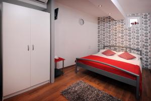 Giường trong phòng chung tại Rooms & Apartment Lasta