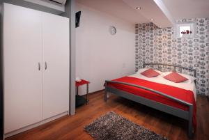 Posteľ alebo postele v izbe v ubytovaní Rooms & Apartment Lasta