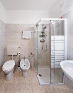 Koupelna v ubytování Hotel Roma