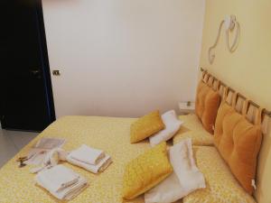 Postel nebo postele na pokoji v ubytování B&b regina del porto
