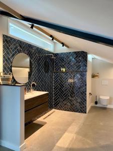 Koupelna v ubytování Luxe Loft voor 4 personen