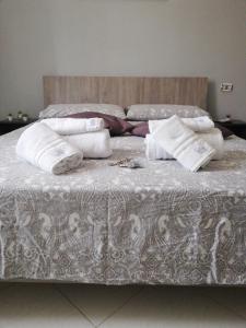 Postel nebo postele na pokoji v ubytování B&b regina del porto