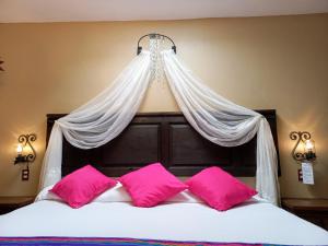 Кровать или кровати в номере La Escondida Hotel Boutique