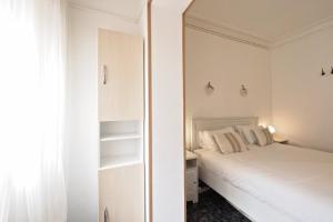 Posteľ alebo postele v izbe v ubytovaní Stay U-nique Apartments Tapioles