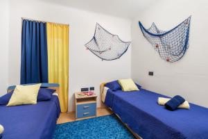 Postel nebo postele na pokoji v ubytování Villa Seastar + 57 fotografií