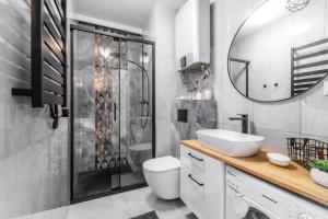 Koupelna v ubytování Apartamenty Mierzeja NCNK Stegna Park Standard- 500 m do plaży
