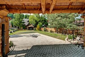 Zahrada ubytování Magnat Inn Sauna & Relax
