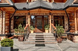 Exteriér nebo vchod ubytování Magnat Inn Sauna & Relax