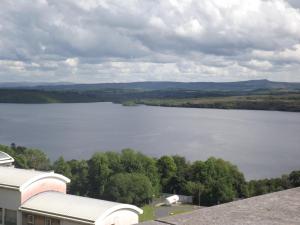 a view of a lake from a building at St Angela's Lakeside Aparthotel SALA in Sligo