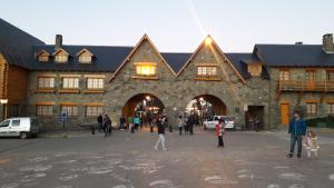a group of people standing in front of a building at Lo de Ramón in San Carlos de Bariloche