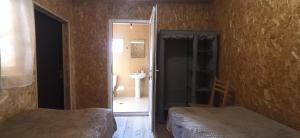 Postel nebo postele na pokoji v ubytování Guesthouse Sagrila