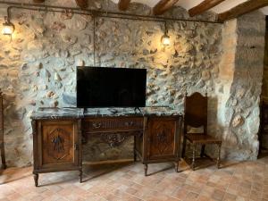 Un televizor și/sau centru de divertisment la Casa Rural con encanto en el casco antiguo Tarragona