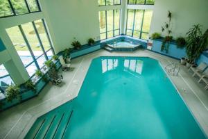 an overhead view of a swimming pool in a building at Sunrise Timberline I7 in Killington