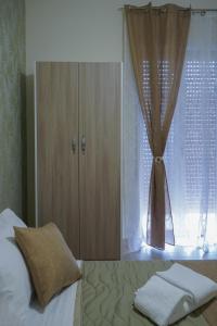 Postel nebo postele na pokoji v ubytování Frebi's Home - Bed & Breakfast