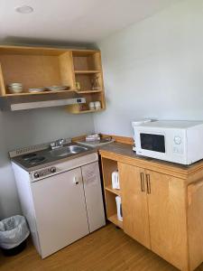 Dapur atau dapur kecil di Chalets Glenn