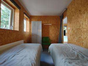 Giường trong phòng chung tại Drenths Landgoed, Welkom thuis