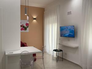 Телевизор и/или развлекательный центр в Pianohome Sorrento