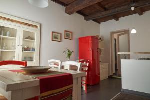 A kitchen or kitchenette at Affittacamere La Piazzetta