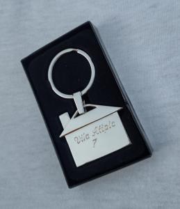 a small black tag with a nice shuttle keychain at Vila Atipic in Costinesti