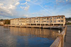 a large building next to a body of water at Silver Cloud Hotel - Mukilteo Waterfront in Mukilteo