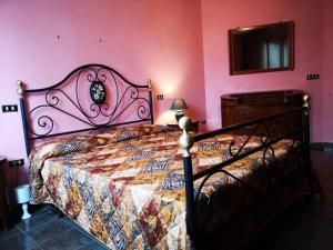 Postel nebo postele na pokoji v ubytování Il Rovo di More