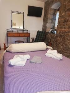 Postel nebo postele na pokoji v ubytování Samothraki