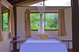 Letto o letti in una camera di Montezuma Hills - Two Houses in a private compound