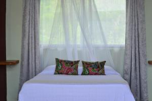 Letto o letti in una camera di Montezuma Hills - Two Houses in a private compound