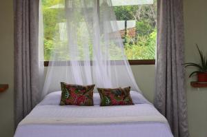 Letto o letti in una camera di Montezuma Hills - Two Houses in a private compound