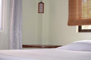Letto o letti in una camera di Montezuma Hills - Two Houses in a private compound