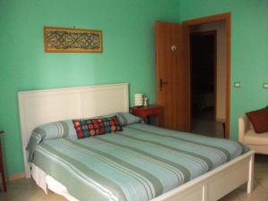 Postel nebo postele na pokoji v ubytování B&B Miroca