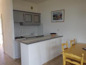 A kitchen or kitchenette at Marina di fiori