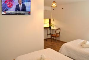 Postel nebo postele na pokoji v ubytování Hotel Boutique Casona Violeta