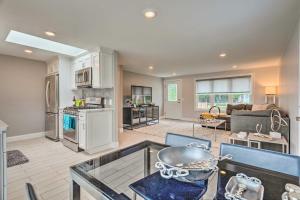 a kitchen and living room with a counter top at Narragansett Escape by Narrow River and Beaches in Narragansett