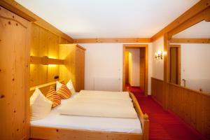 Voodi või voodid majutusasutuse Hotel Alpenblick toas