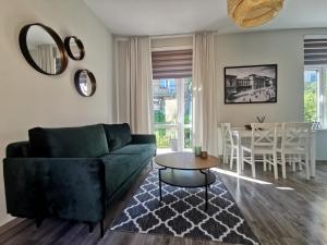 Posedenie v ubytovaní Apartament "Nad dachami"