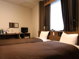 TV a/nebo společenská místnost v ubytování Odawara Terminal Hotel